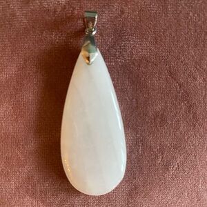 White Stone pendant with 18K white gold plated hardware.